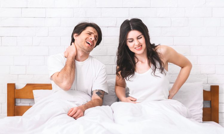 couple-experiencing-pain-after-sleeping-on-a-bad-m-2024-06-18-23-55-14-utc